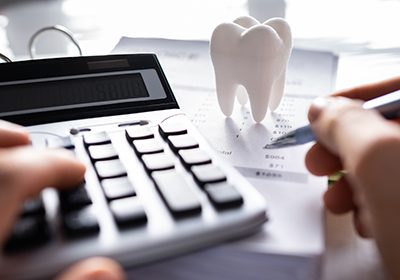 Patient in Dallas budgeting for a root canal