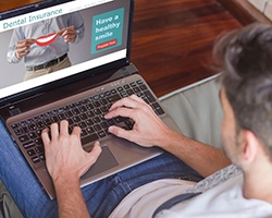 Patient in Dallas checking dental insurance for root canal coverage