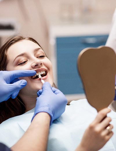 a patient receiving veneers